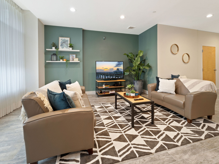 Spacious living room in apartmentat The Printing House | Binghamton Apartments
