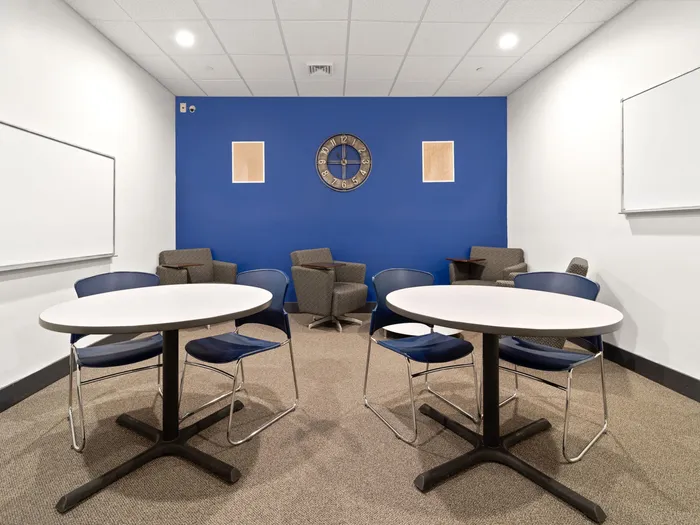 Study room with whiteboards at The Printing House | Binghamton Apartments