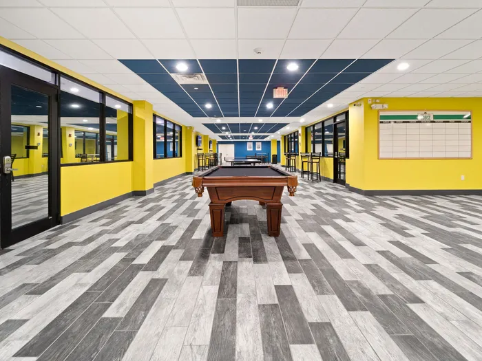Pool table in commons areaat The Printing House | Binghamton Apartments