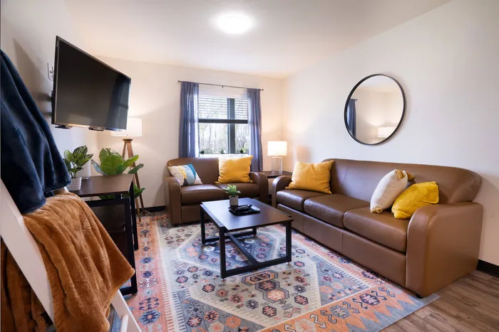 Furnished living room at student apartments at Tech Village.