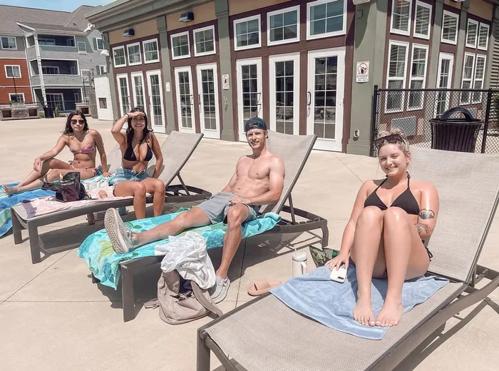 Residents enjoying the pool | 48 West | Allendale, Michigan Apartments