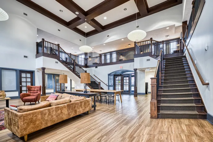 Wide view of clubhouse with comfortable seating at 48 West | Allendale, Michigan