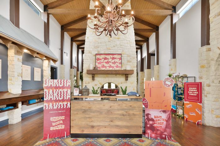 Clubhouse with fire feature Dakota Ranch Student Apartments | Apartments Near Texas State University