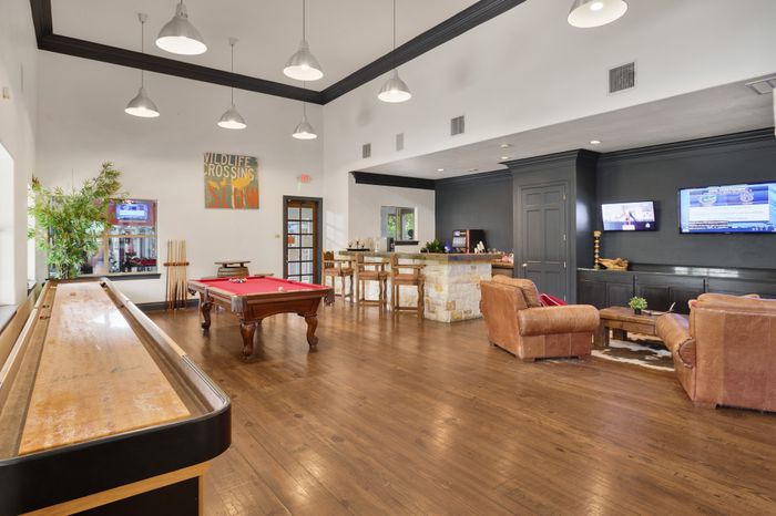 Shuffleboard and Pool Table at Dakota Ranch Student Apartments | San Marcos Student Apartments