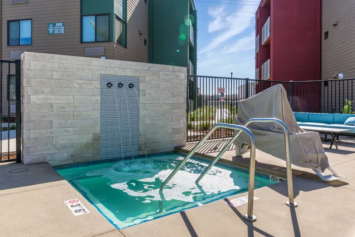 Hot pool and sundeck  at Merced Station apartments