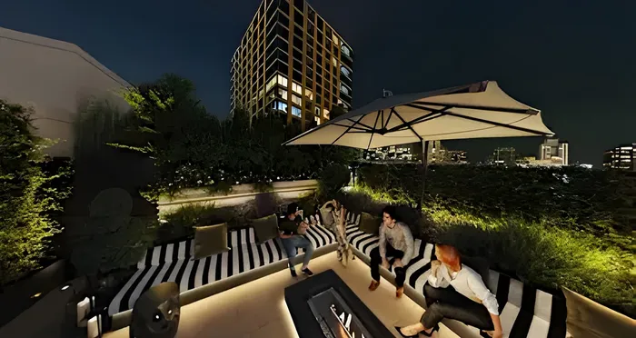 Luxurious rooftop patio at night with elegant seating, ambient lighting, and stunning city views, perfect for relaxation and entertainment.