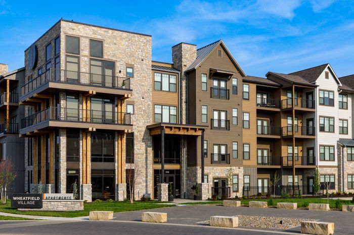 Wheatfield Village: Embrace a vibrant lifestyle in our stunning exterior building. Experience the epitome of luxury living, surrounded by meticulously landscaped grounds and contemporary architectural design