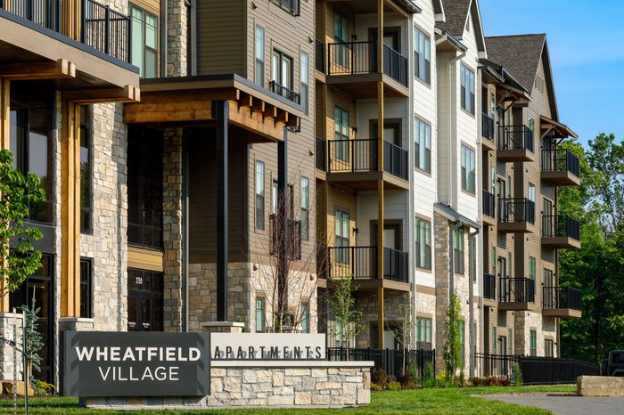 Wheatfield Village: Embrace a vibrant lifestyle in our stunning exterior building. Experience the epitome of luxury living, surrounded by meticulously landscaped grounds and contemporary architectural design