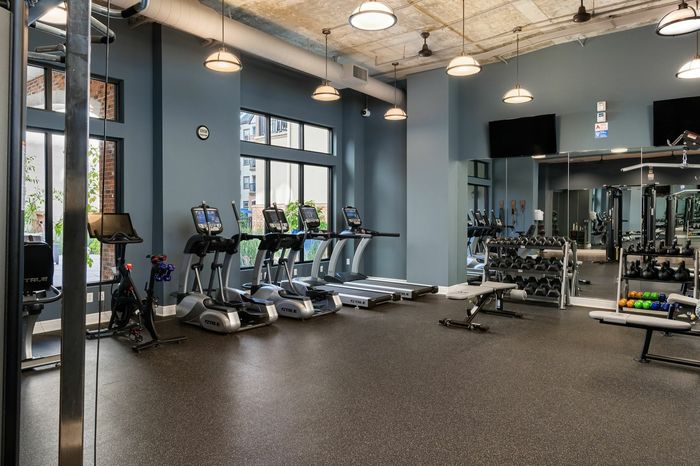 Fitness Center - A well-equipped fitness center with modern exercise machines, offering residents a convenient place to stay active and healthy