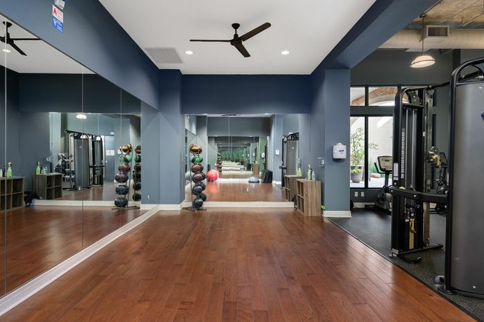 Yoga Studio - A serene yoga studio, providing residents a tranquil space to practice mindfulness and relaxation.