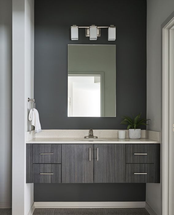 Modern bathroom with white vanity and contemporary fixtures