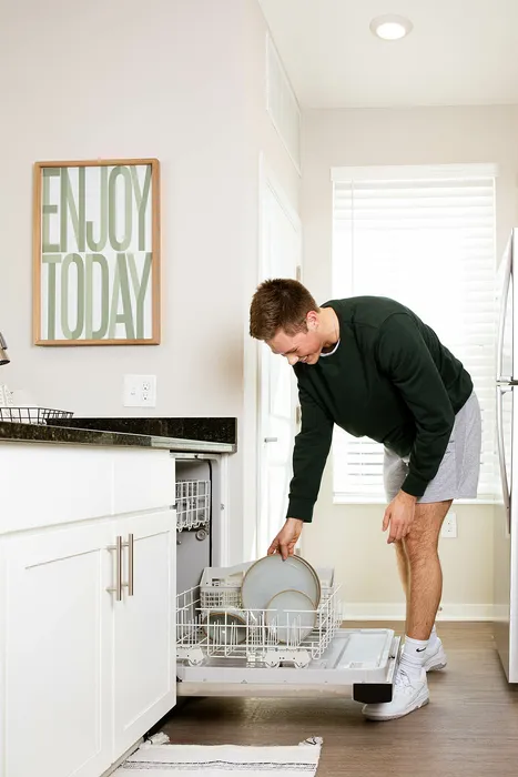 Resident Loading Dishwasher | Crescent Woods Apartments | Apartments in Gahanna, OH