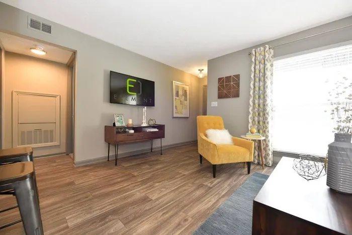 Living room with hardwood-style flooring