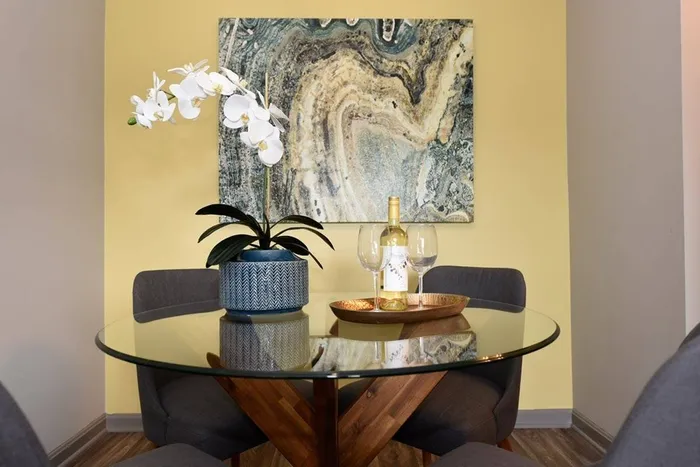 Dining area with table and wine glasses
