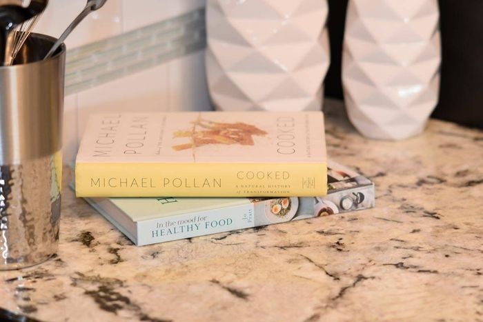 Kitchen decor- cook books on granite counters