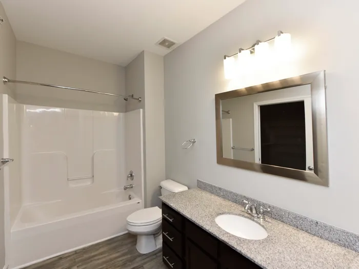 Beautiful new lighting fixtures and granite counter top vanities