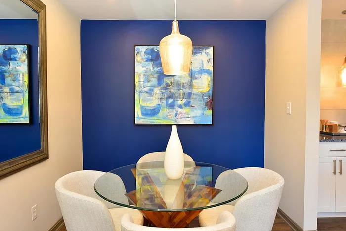Business Center & Coffee Bar with Bright Blue Accent Wall