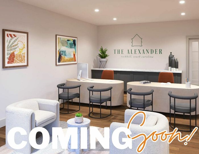 Inviting office setting at The Alexander, Rockhill, South Carolina, featuring modern chic furniture and vibrant artwork. Coming soon!