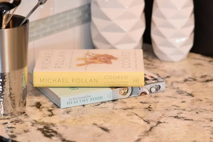 Kitchen decor- cook books on granite counters