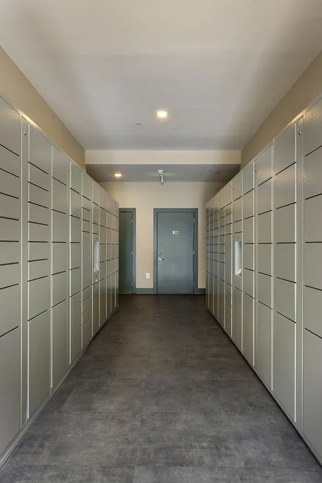 Modern apartment mailroom with sleek locker design, ample storage, and convenient access.