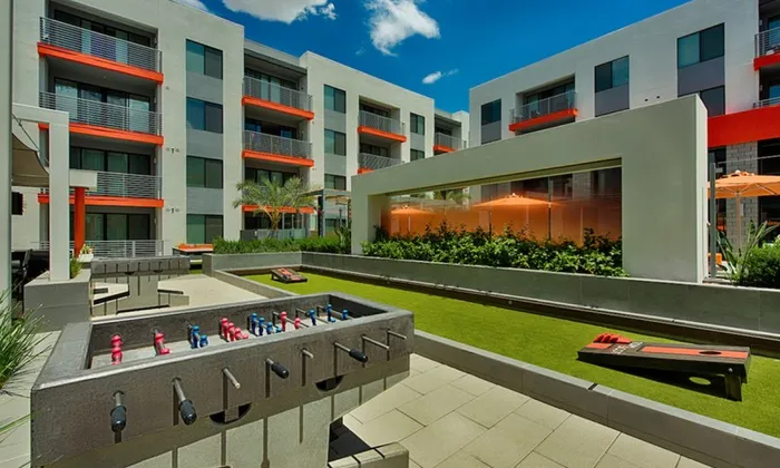 The Tomscot | Outdoor Cornhole and Hockey Game | Apartments in Scottsdale