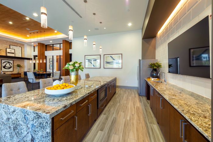 Expansive club room with ample entertainment spaces