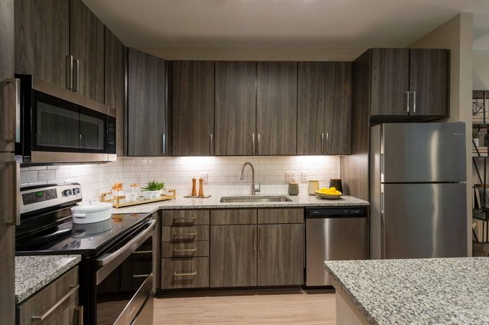 Stainless steel appliances and under cabinet lighting