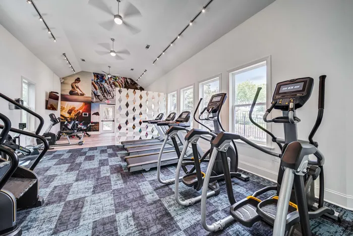 fitness center with cardio machines