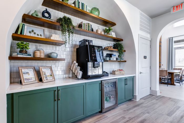 Beverage refrigerator under self serve coffee machine on counter