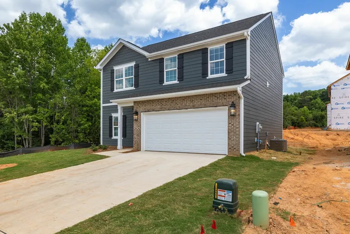 Front Exterior Angle Right with attached 2 car garage