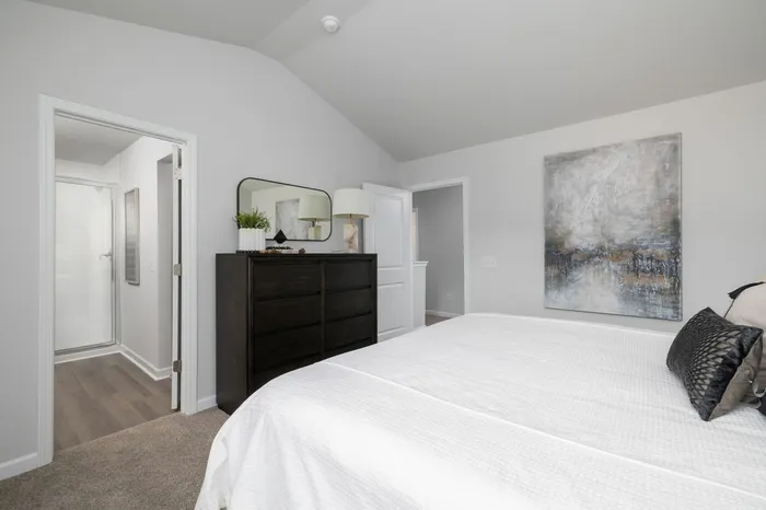 Bedroom with vaulted ceilings
