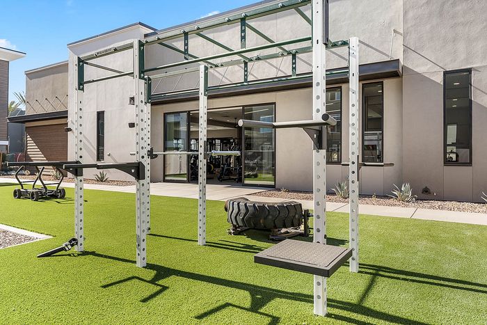 Navona exterior fitness center, green turf