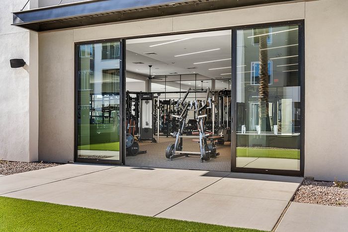Navona Exterior fitness center facing sliding glass doors