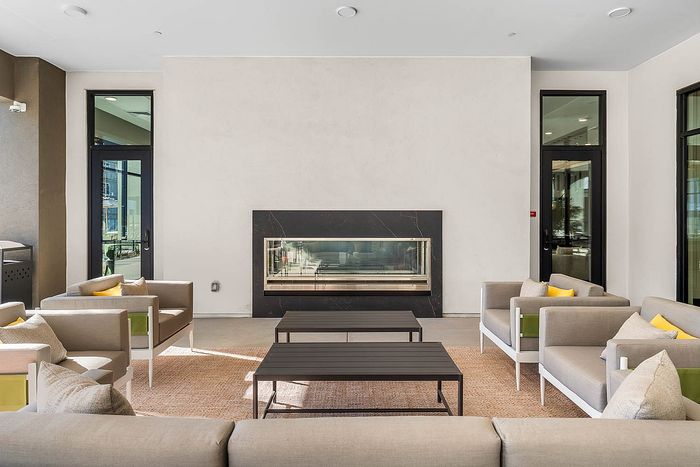 Exterior outdoor lounge seating, fireplace