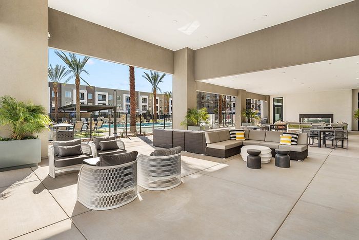 Navona exterior lounge seating, tables and chairs, ceiling lighting, fireplace