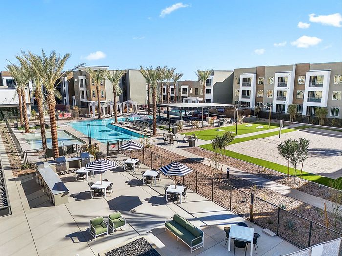 Navona exterior bird's-eye view pool, volleyball court, bbq grills