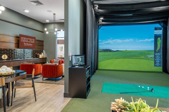 Navona interior clubhouse, Putting green, ceiling lighting, hardwood floors