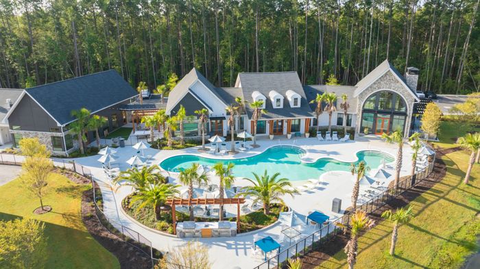 exterior aerial of clubhouse and poool
