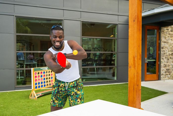 man playing ping pong