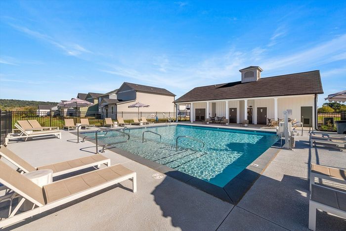 A community pool and lounge chairs at Highline at Knoxville luxury homes in Knoxville, TN