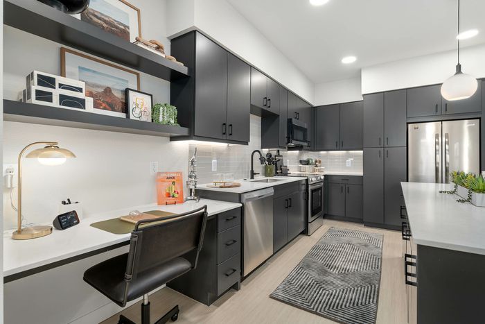 Navona kitchen, cabinet space, stainless steel appliances, ceiling lighting