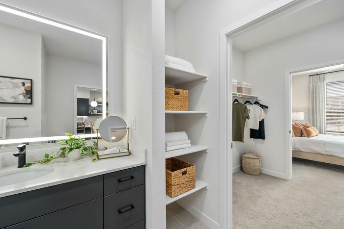 Navona bathroom, tile floors, cabinet space, shelves