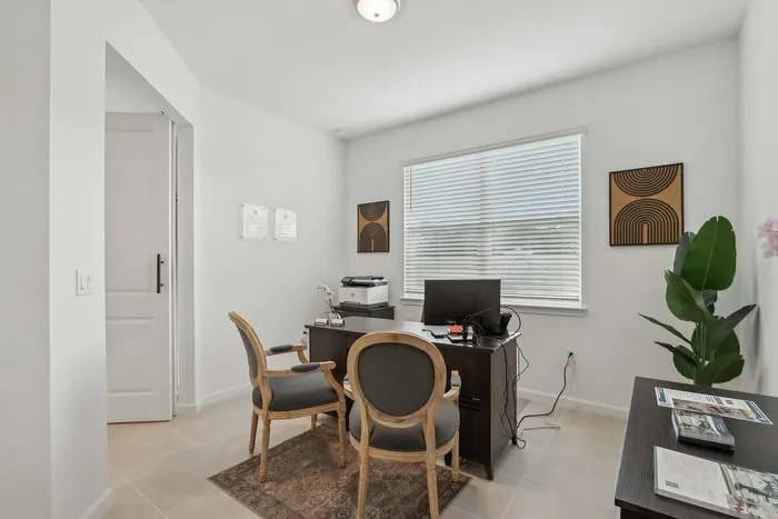 guest bedroom set up as a home office