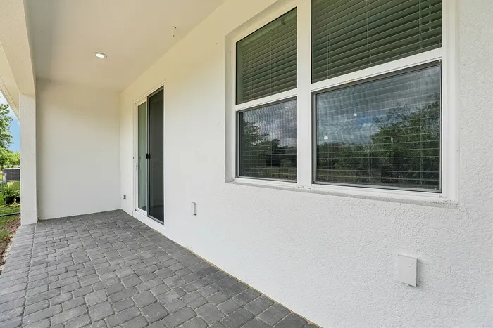 covered patio behind townhomes