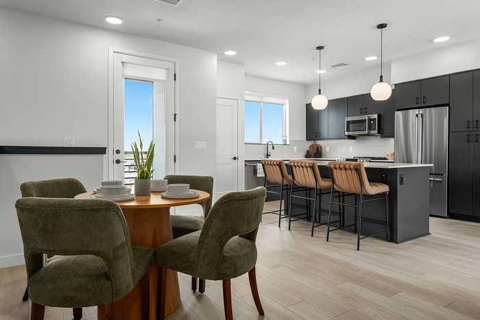 Navona interior kitchen furnished stainless steel appliances, hardwood floors