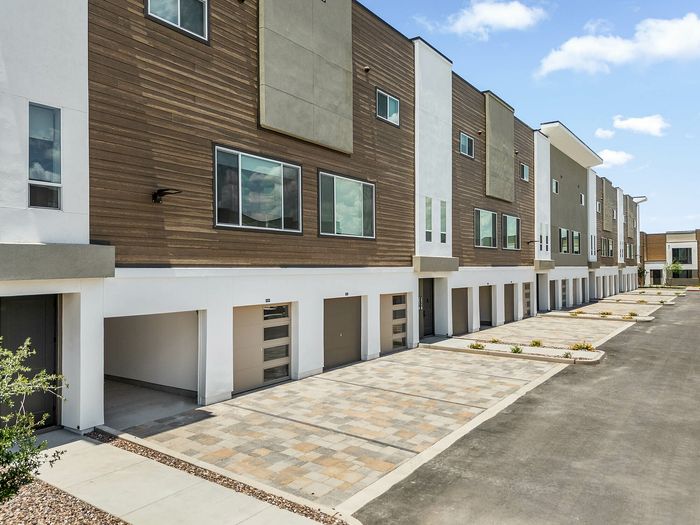 Navona exterior community building, garages