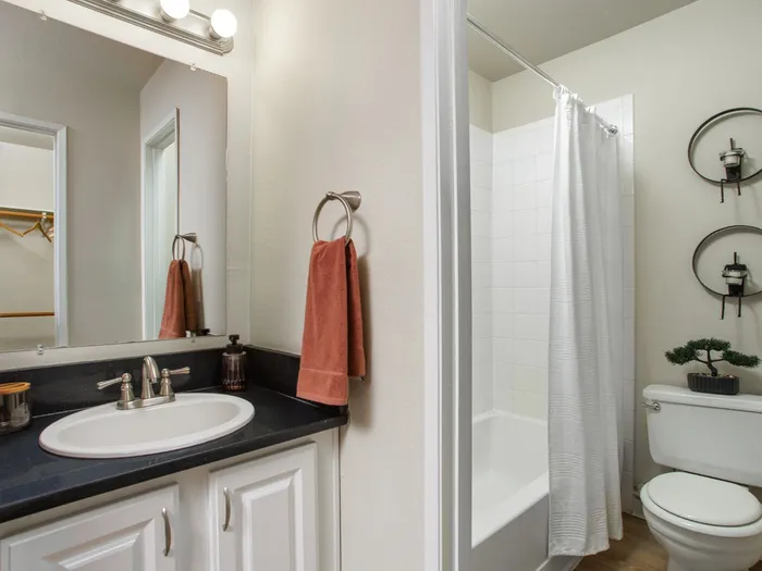 Primary Bathroom with a shower and bathtub