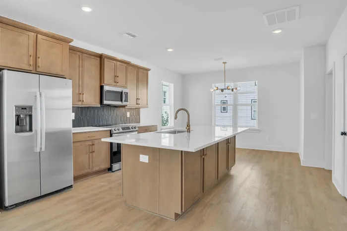 Spacious Kitchen with Modern Finishes and Island
