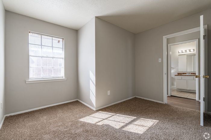 Colonial Village Apartments - Carpeted Bedroom
