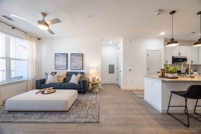 Open concept living room and kitchen in the Garrett Parker B1 floor plan